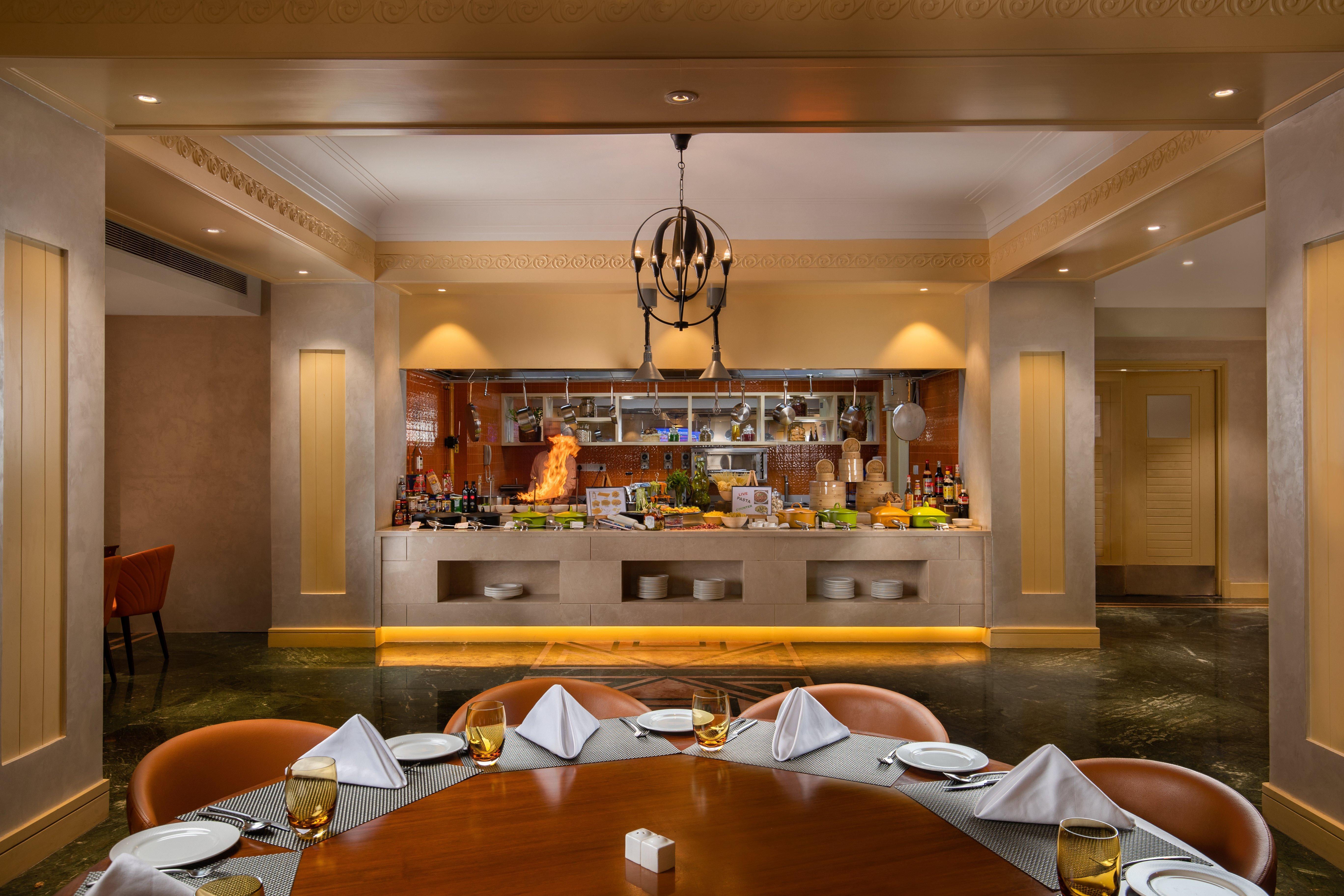 ฮอลิเดย์ อินน์ อัครา เอ็มจีโร้ด ภายนอก รูปภาพ The open kitchen at the restaurant
