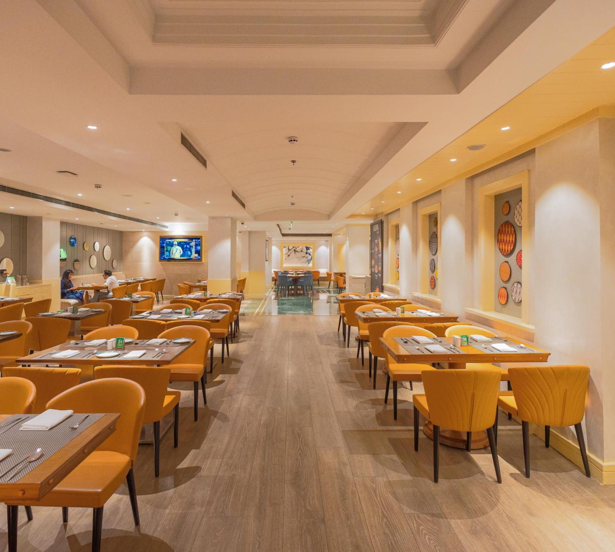 ฮอลิเดย์ อินน์ อัครา เอ็มจีโร้ด ภายนอก รูปภาพ The restaurant